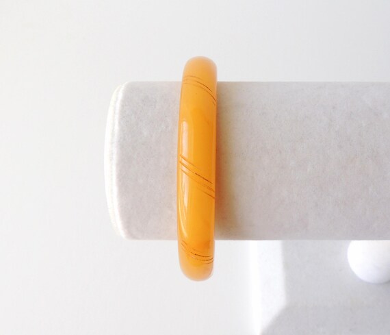 Carved Butterscotch Bakelite Bangle