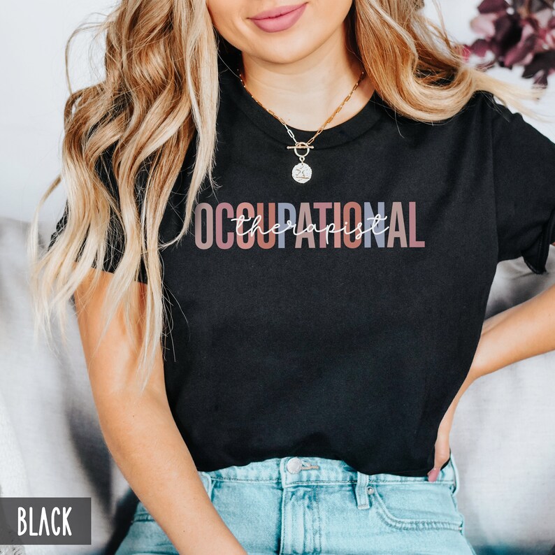 May include: Black t-shirt with the text "OCCUPATIONAL therapist" in rainbow colors.