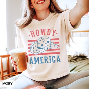 Comfort Colors® July 4th Boxy Tee, Howdy America Cowgirl Hat Stars & Stripes Flag Shirt for Women, Cropped Cute Independence Day tee for her