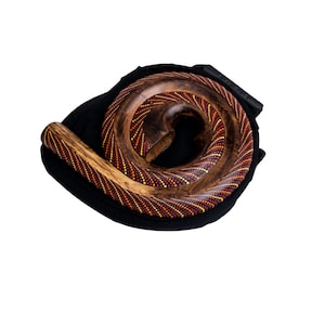 Didgeridoo instrument de forme ronde matériaux naturels sac de voyage spirale Australie Rouge