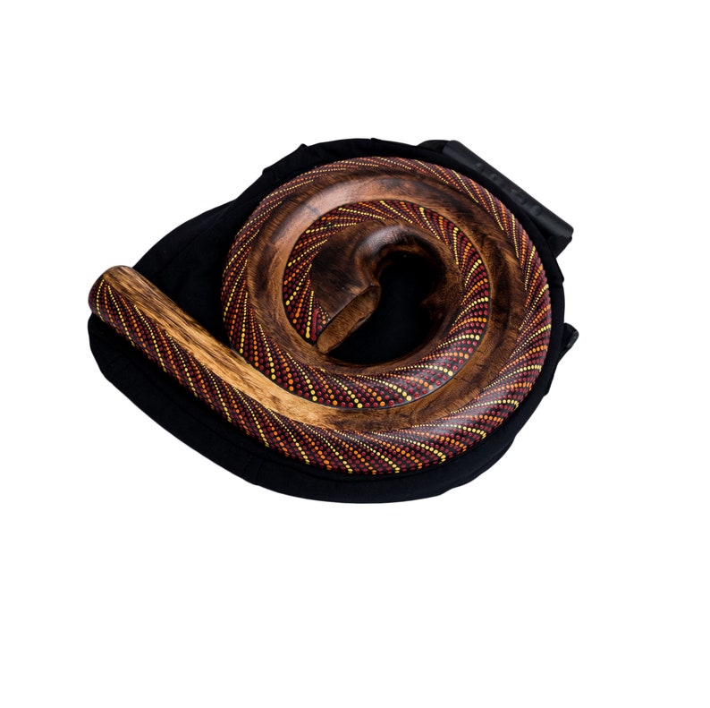 Didgeridoo instrument de forme ronde matériaux naturels sac de voyage spirale Australie Rouge