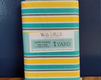 May include: A 1 yard piece of yellow, teal, and gray striped cotton fabric. The fabric is labeled "Waverly Inspirations 100% Cotton 36in x 44in 91.45cm x 111.8cm 1 Yard For Crafting, Quilting, Apparel, and Home Decor Projects."