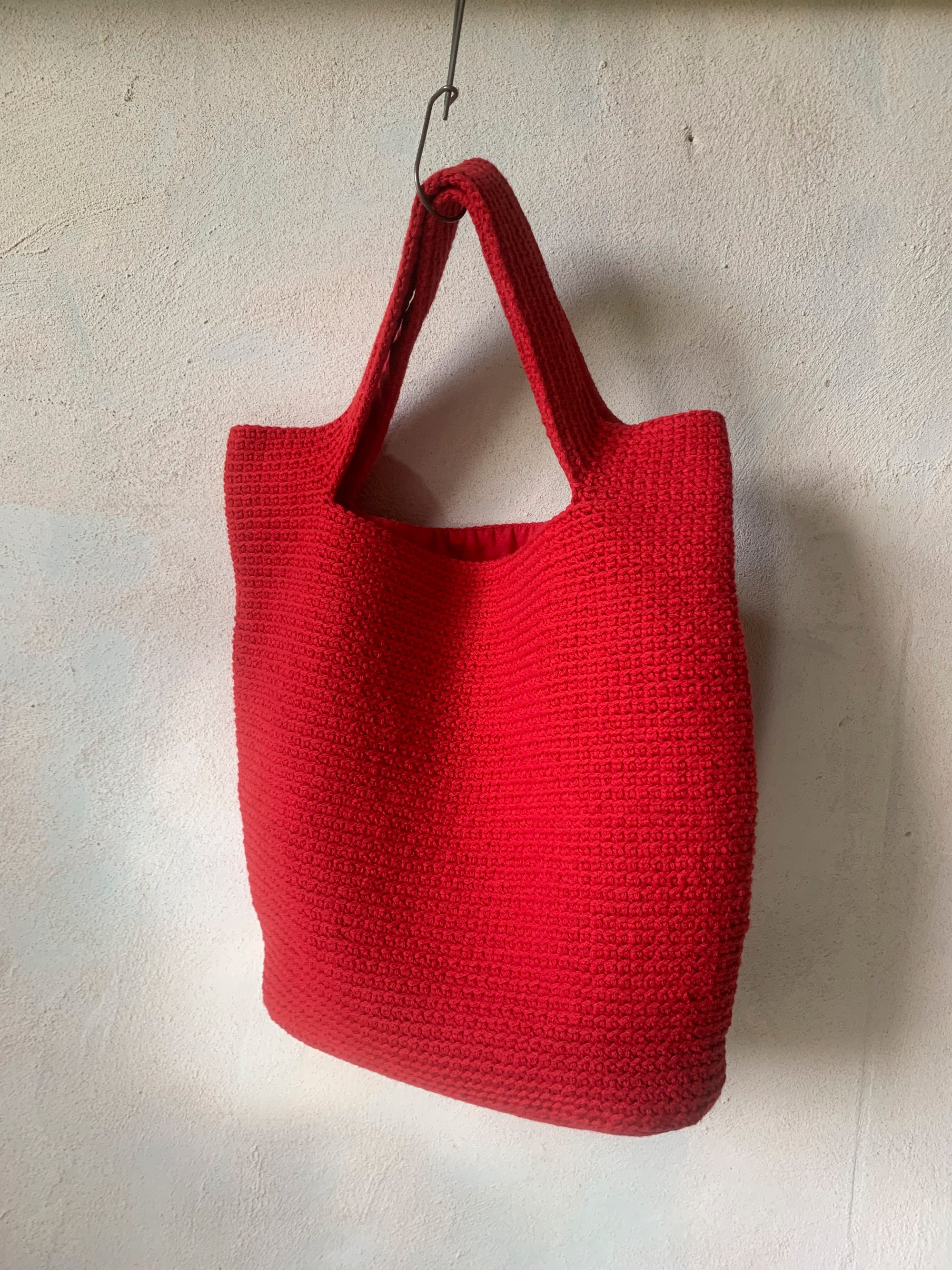 red crochet shoulder bag