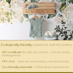 May include: Eco-friendly wall decals with a floral design featuring white roses and hydrangeas. The decals are shown on a white wall with a wooden shelf and a baby outfit hanging on a hanger. The text "Cheerful Walls" is visible in the top left corner of the image. The text "Ecologically friendly solution for wall decoration" is visible in the bottom of the image. The text "ISO certificate for safe use indoors - schools, hotels, kindergartens" is visible in the bottom left corner of the image. The text "PVC-Free - does not emit noxious, chemical scents" is visible in the bottom left corner of the image. The text "Eco-friendly materials - I think about environment!" is visible in the bottom left corner of the image.
