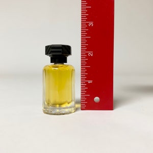 Ricci Club by Nina Ricci eau de toilette for men, 10 ml .30 fl,oz travel size dab on non spray miniature bottle new without the box.
