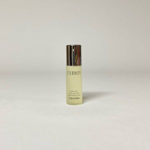 Eternity by Calvin Klein for women, .5 fl oz 15 ml Body Mist Alcohol Free miniature spray small travel size bottle, not used without the box