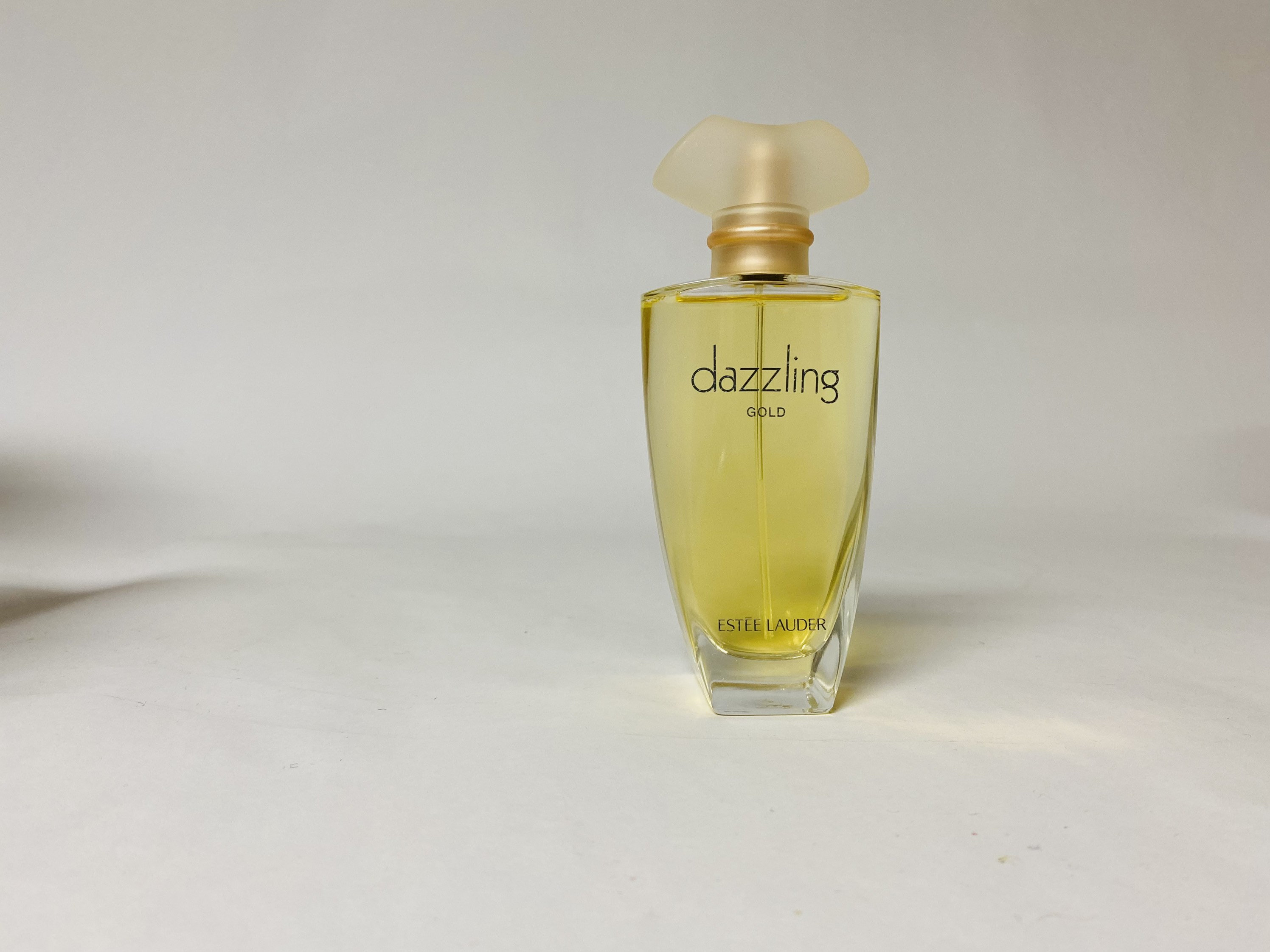 Dazzling gold estee lauder perfume sale