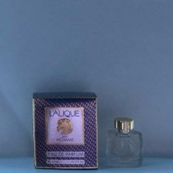 Lalique equus ( horse) by Lalique for men, eau de parfum 4.5 ml/ .15 fl oz dab on non spray travel size miniature bottle in its original box