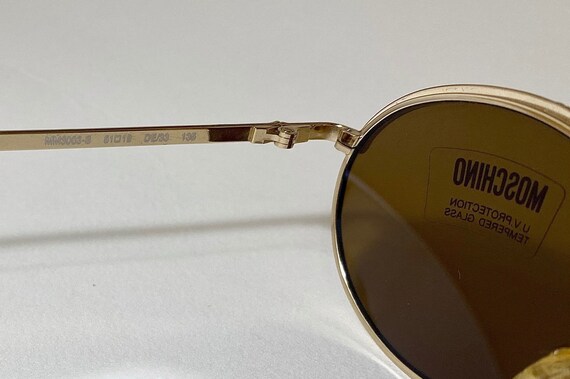 vintage 1990s MOSCHINO sunglasses cut out logo glasses frames black plastic