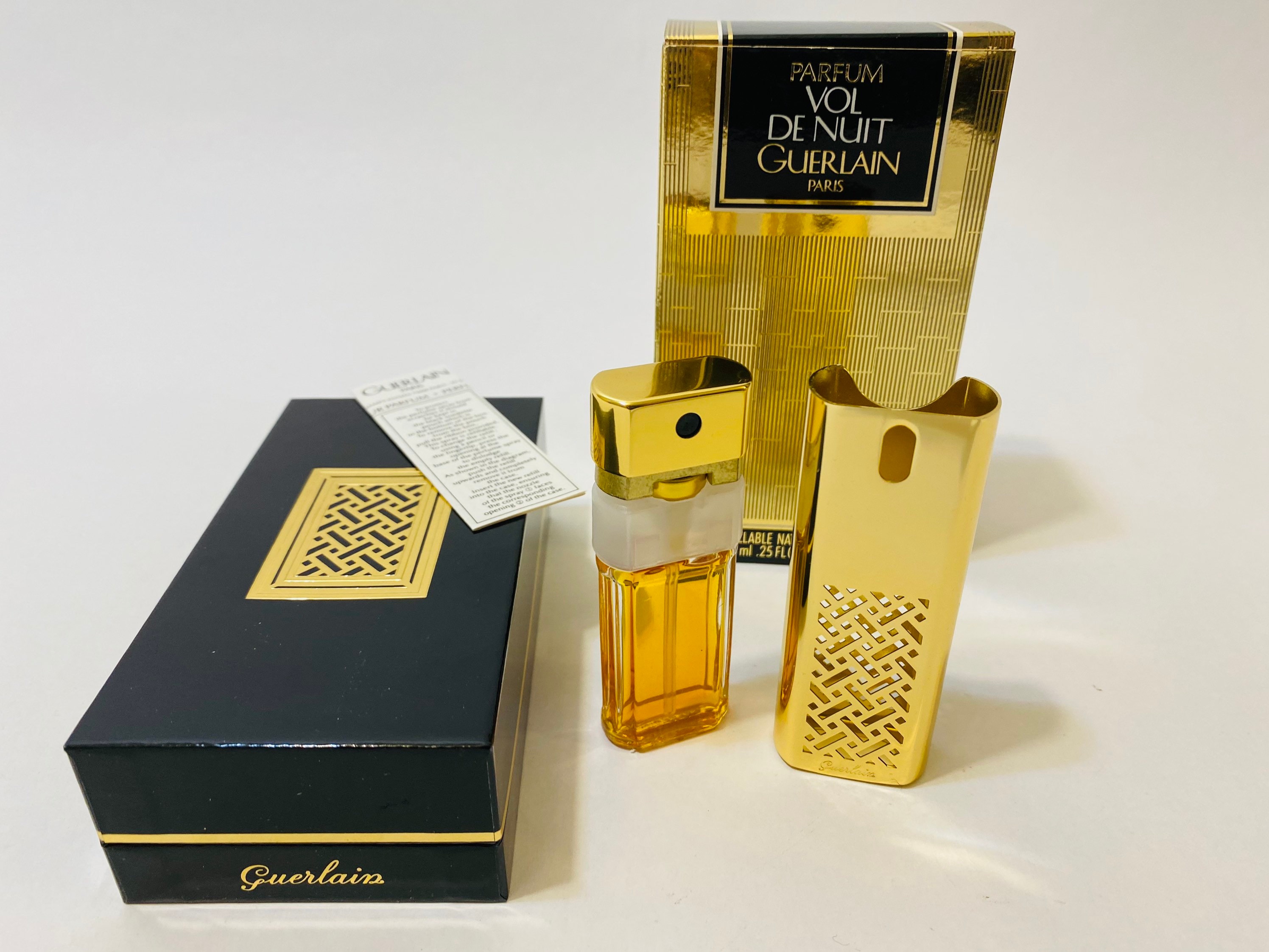 Vol De Nuit by Guerlain for women, .25 fl oz / 8ml Parfum spray with refillable case, new in it;s original box, vintage hard to find.