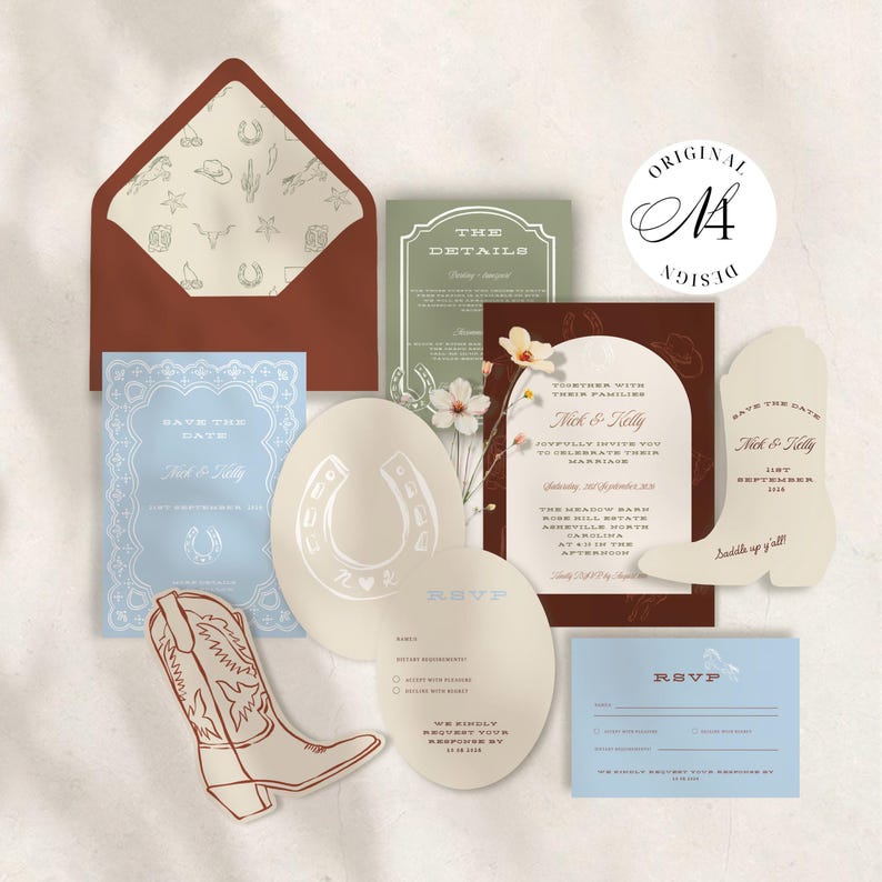 May include: A wedding stationery suite featuring a rust-colored envelope with a patterned liner, a light blue Save the Date, a dark brown invitation, a boot-shaped card, and RSVP cards in cream and blue, all decorated with western-themed illustrations.