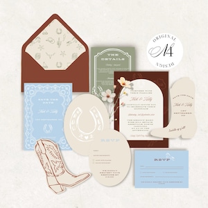 May include: A wedding stationery set featuring a brown envelope with a patterned liner, a light blue save the date card, a dark brown invitation, a boot-shaped card, and oval RSVP cards. The designs include horseshoe, cactus, and boot illustrations.