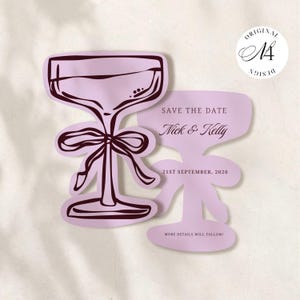 Op de afbeelding: Een lichtpaarse Save the Date-kaart in de vorm van een champagnecoupe met een donkerpaarse lijntekening van een glas en een strik. De tekst luidt: SAVE THE DATE, Nick & Kelly, 21ST SEPTEMBER, 2026, en MORE DETAILS WILL FOLLOW!