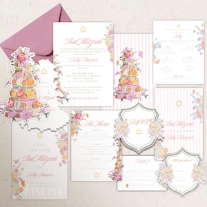May include: A Bat Mitzvah stationery set featuring pink envelopes, floral illustrations, and a macaron tower motif. The collection includes invitations, menu cards, and RSVP cards with gold Star of David symbols and pink text detailing the event for Kelly Harper.