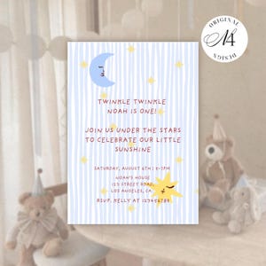 May include: A rectangular birthday invitation card with a light blue and white vertical striped background. It features a blue crescent moon, a yellow star with a face, and smaller yellow stars. The text reads: TWINKLE TWINKLE NOAH IS ONE! JOIN US UNDER THE STARS TO CELEBRATE OUR LITTLE SUNSHINE. SATURDAY, AUGUST 6TH | 5-7PM. NOAH'S HOUSE, 123 STREET ROAD, LOS ANGELES, CA. RSVP. KELLY AT 123456789.