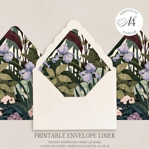 May include: A printable envelope liner featuring a botanical pattern of light purple iris flowers, dark green foliage, and clusters of small pink blossoms. The design includes a circular white logo with the text Original Design in the upper right corner.