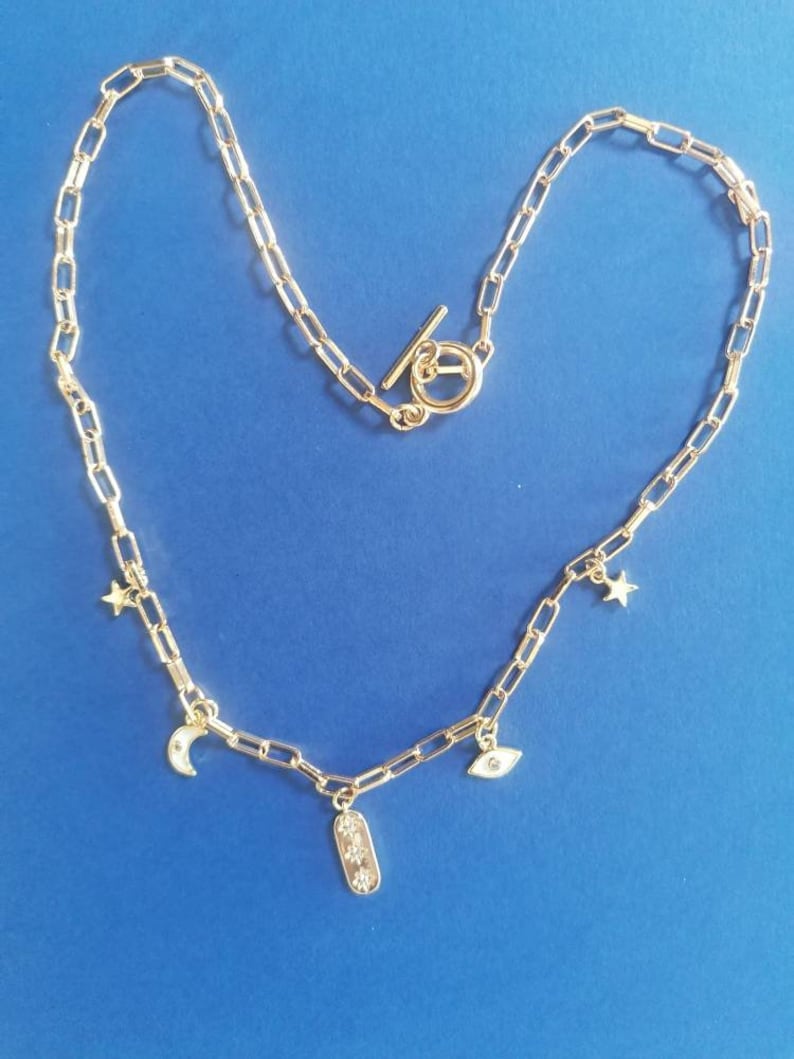 Wide chain links with eye charms moon and stars