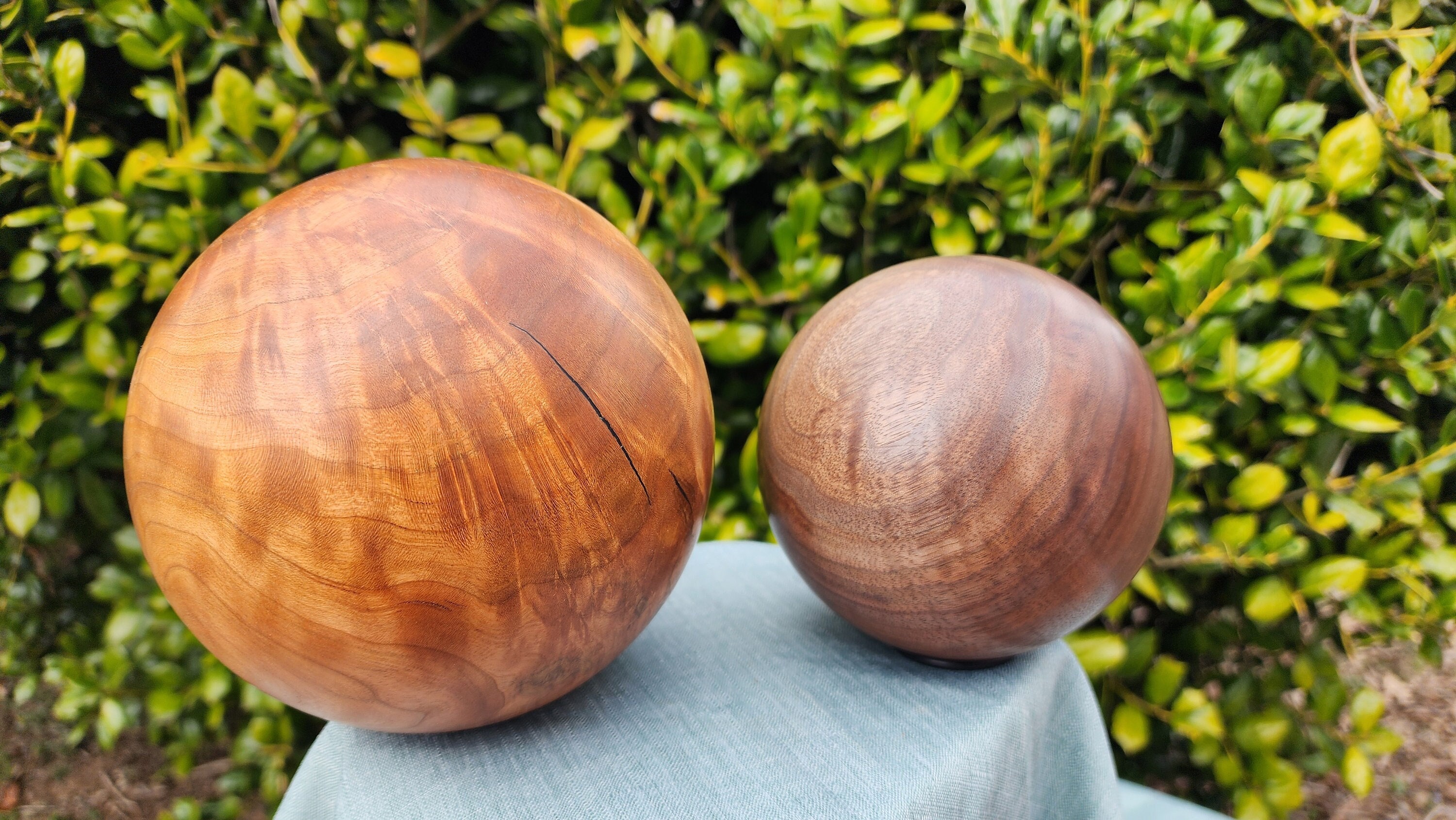 Close-up of a decorative wooden sphere with visible grain.