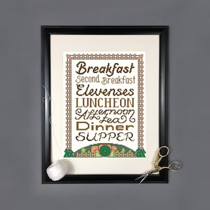May include: A framed cross-stitch design featuring a hobbit hole with a sign that reads "Breakfast, Second Breakfast, Elevenses, Luncheon, Afternoon Tea, Dinner, Supper".