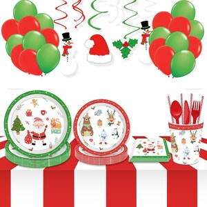 May include: A Christmas party set with red and green plates, cups, napkins, and cutlery. The plates feature a Santa Claus, reindeer, and other winter characters. The cups and napkins have a similar design. The set also includes red and green balloons, a snowman, and a Santa hat.