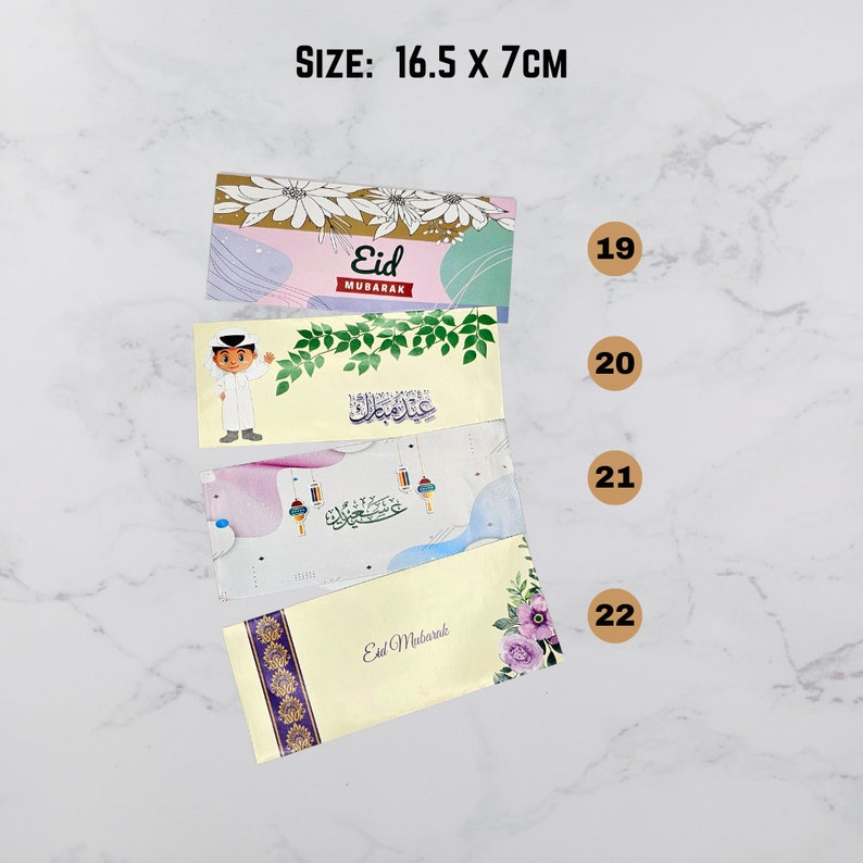 May include: Four different designs of Eid Mubarak greeting cards. Each card is 16.5 inches by 7 inches and features a different design with Arabic calligraphy and floral patterns.