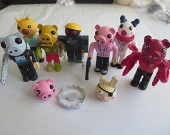 Roblox Piggy toy- Heads pig heads torcher skully brother robby chainsaw arm accessories custom piggy heads