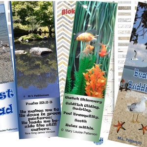 Könnte beinhalten: Vier Lesezeichen-Designs mit verschiedenen Themen. Das erste Lesezeichen zeigt eine Strandszene mit Möwen und dem Text "Best Dad". Das zweite Lesezeichen zeigt einen Teich mit einer Spiegelung von Bäumen und dem Text "Psalm 23:2-3 Er lässt mich lagern auf grünen Auen: Er führt mich an stillen Wassern entlang. Neue King-James-Version". Das dritte Lesezeichen zeigt ein Aquarium mit Goldfischen und dem Text "Betrachte schimmernde Goldfische, die gleiten. Wirbeln. Fühle Ruhe. Beruhige dich Entspanne dich im Inneren.". Das vierte Lesezeichen zeigt eine Strandszene mit Möwen und dem Text "Beach Buddies".