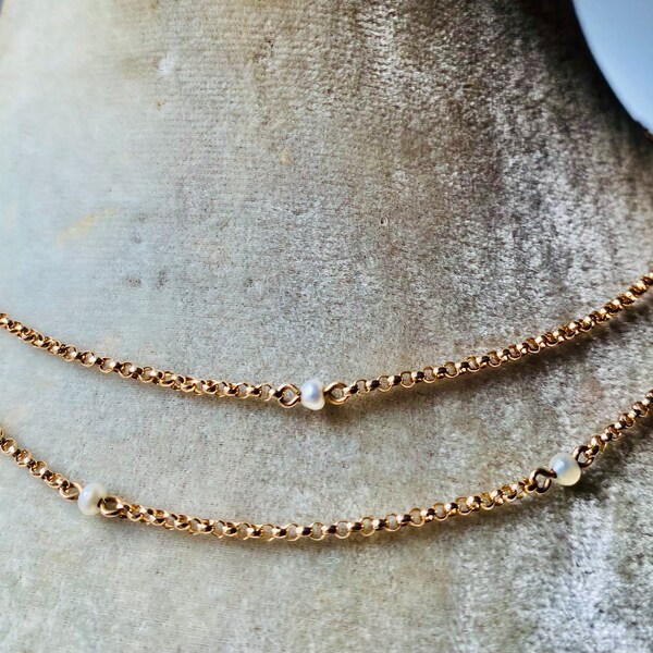 True Elegance: 9ct Gold Edwardian  26’ long chain Necklace set with fine pearl spaces circa 1900s