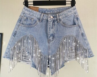 ripped shorts with chains