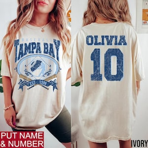 May include: A rustic wooden sign with the text "Welcome to our home" in white lettering. The sign features a distressed finish and a simple, inviting design, perfect for front door decor.