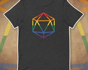 May include: A dark heather grey t-shirt with a rainbow-colored outline of a twenty-sided die.