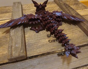 Crystal dragon 3d printed 12 inches long and 4.5 inches tall! Articulated fidget toy. Dark red with sparkles