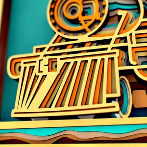 May include: A close-up of a wooden model of a train engine. The engine is made of layered wood and painted in shades of brown, orange, and yellow. The engine has a large wheel and a detailed design.