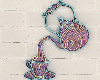 May include: A teal blue teapot with a swirling purple, pink, and yellow pattern pours tea into a matching teacup and saucer.