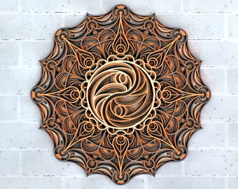 May include: A brown and gray wooden mandala with intricate details and a swirling pattern in the center.
