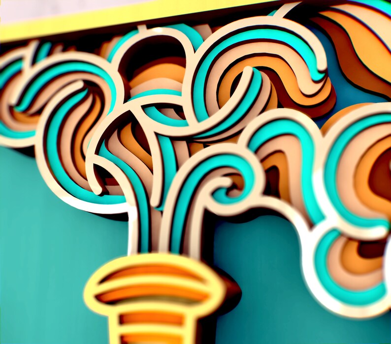 May include: Abstract paper art sculpture with swirling, layered shapes in shades of teal, brown, and yellow. The sculpture is reminiscent of a stylized wave or water fountain.