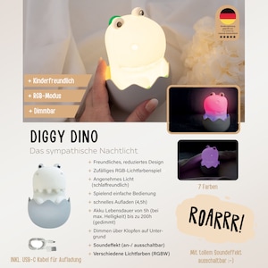 May include: A white dinosaur-shaped night light emerging from a gray eggshell base. The lamp features a smooth surface, two eyes, and a mouth. It includes a USB-C charging cable. Text on the image includes DIGGY DINO, ROARRR!, and various feature descriptions in German.