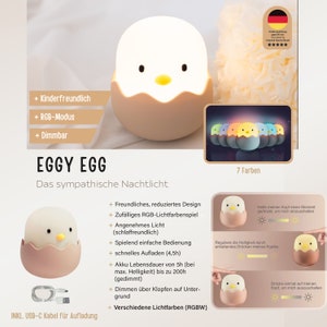May include: A white and light brown egg-shaped LED night light featuring a small chick face with black eyes and a yellow beak. The lamp displays seven RGB colors, includes a USB-C charging cable, and features touch-sensitive dimming controls.