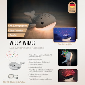 May include: A grey whale-shaped night light with a star-patterned projector on its back. The device emits a warm white glow from its underside and projects colorful stars and shapes. It includes a USB-C charging cable and features text labels.