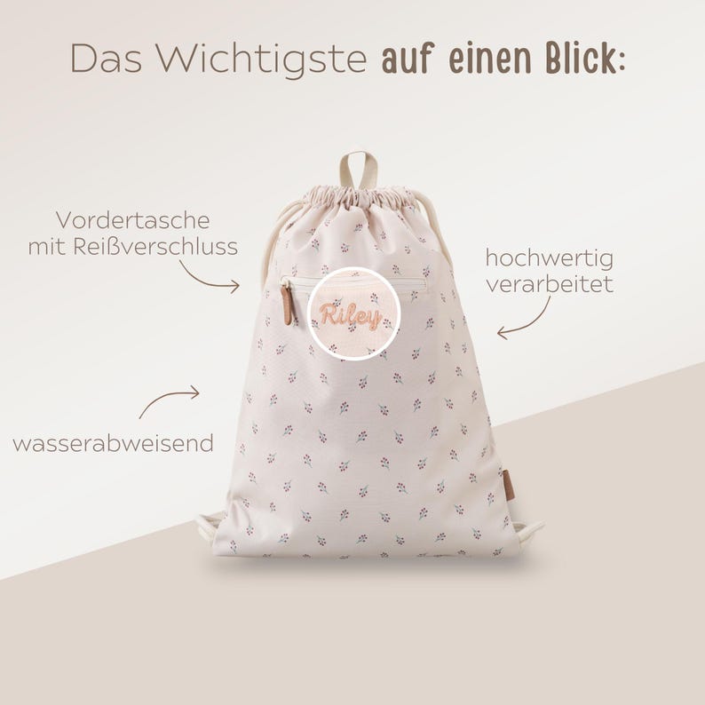 May include: A beige drawstring backpack with a floral pattern and the name "Riley" on a circular patch. The bag has a front zippered pocket and is labeled as water-repellent.