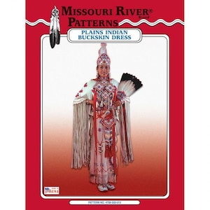 May include: A sewing pattern for a Plains Indian buckskin dress. The pattern is from Missouri River Patterns, and the pattern number is 4790-500-013. The pattern features a woman wearing a white dress with red and blue beadwork, a white feather headdress, and a white feather fan.