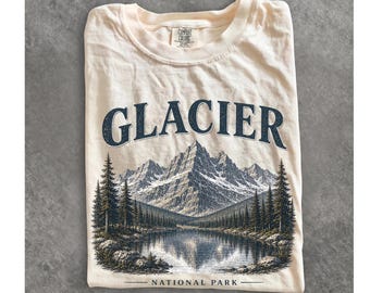 Maglietta vintage del Parco Nazionale dei Ghiacciai, stile retrò anni '90 Comfort Colors® con grafica di paesaggio montano invernale