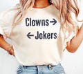 Clowns to the Right Jokers to the Left T-Shirt, Funny Sarcastic Quote Shirt, Retro Meme Humor Gift, Trendy Graphic Tee for Friends product logo