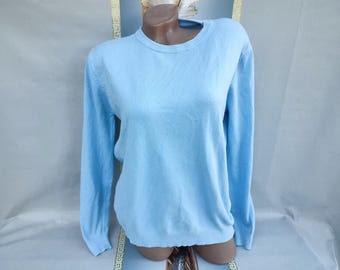 90s Women's Light Blue Pullover. Sizes M-L.