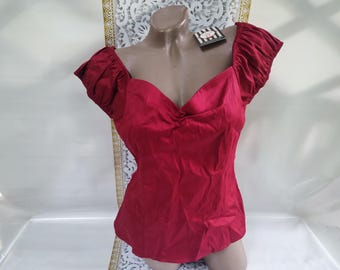 Blusa feminina vintage dos anos 90, em algodão, cor vinho, manga curta e decote aberto. Tamanho M.