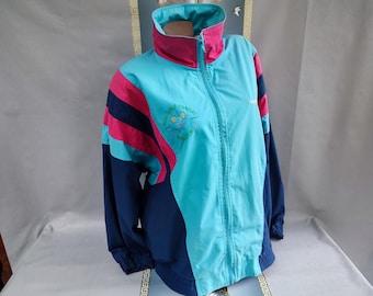 Jaqueta vintage dos anos 90 com blocos de cores e zíper, manga longa. Tamanhos XL a 2XL.
