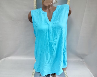 Turquoise mouwloze damestop jaren 90 viscose. Maat L.