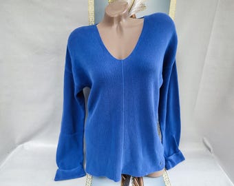Blusa feminina azul canelada de algodão dos anos 90 com decote em V e mangas compridas. Tamanhos G-GG.
