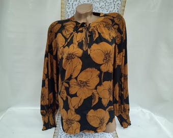 Jaren 90 vintage bruine zwarte bloemenblouse damesblouse met lange mouw. Maat L-XL.