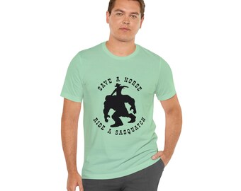 Save A Horse, Ride A Sasquatch Cowboy Unisex Jersey Short Sleeve Tee